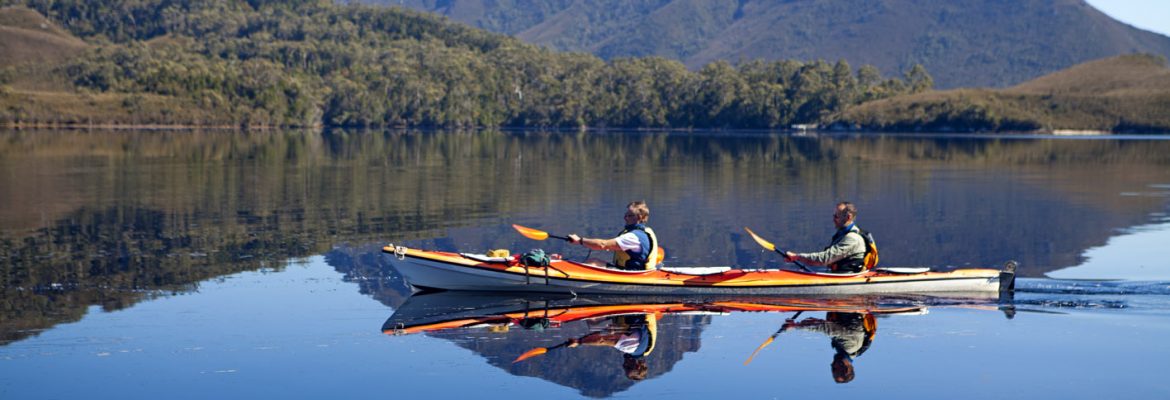 Kayak Bathurst Harbour, Tasmania, Australia